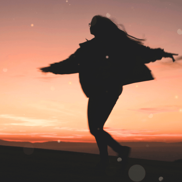 woman dancing at sunset online transformation